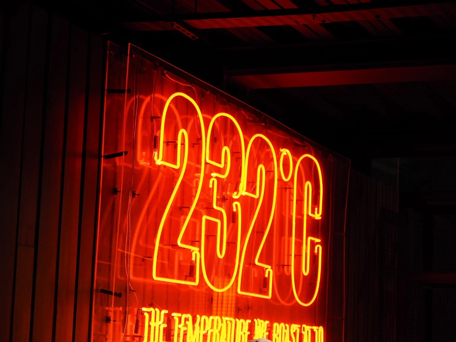 An illuminated 232\u00b0C sign in the brewing exhibition.