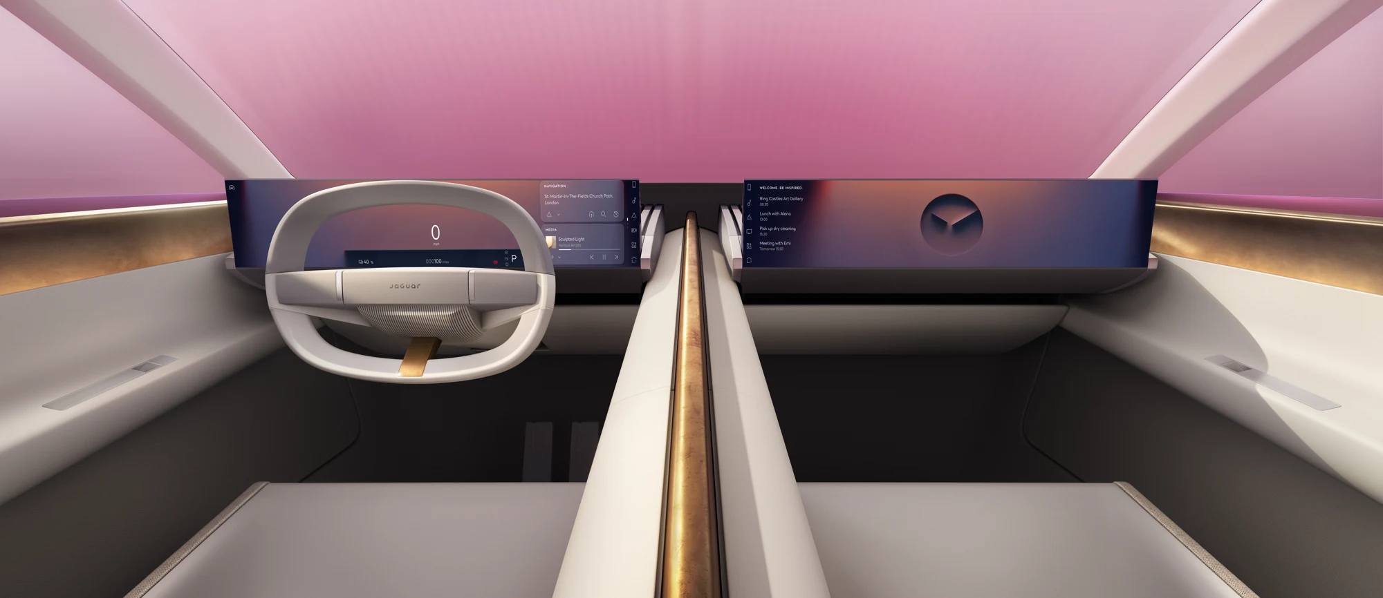 Jaguar Type 00 interior with a long central brass spine, floating dashboard and pale seats.