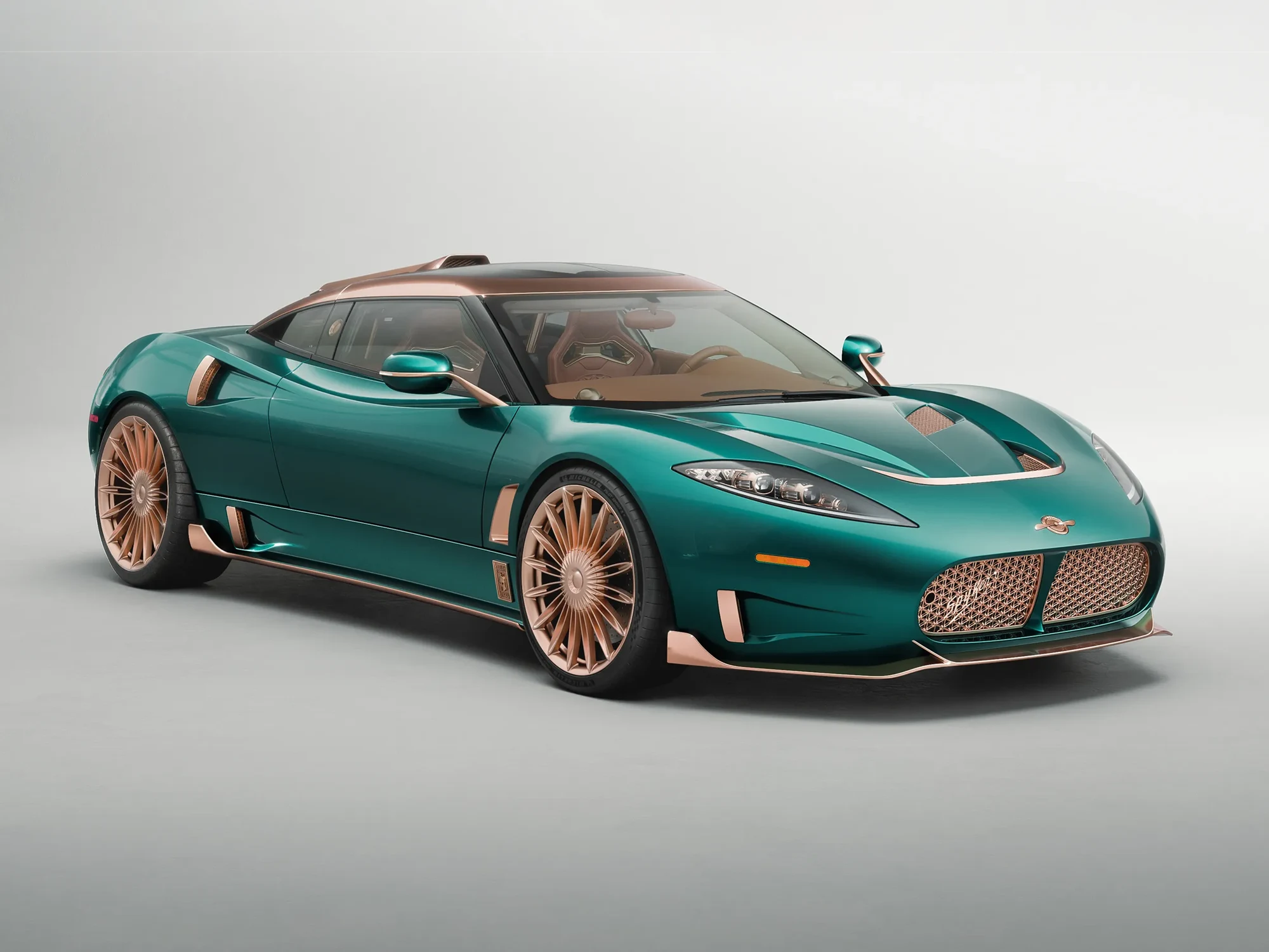 Green Spyker C8 Preliator XXV with rose-gold wheels and twin curved grilles.
